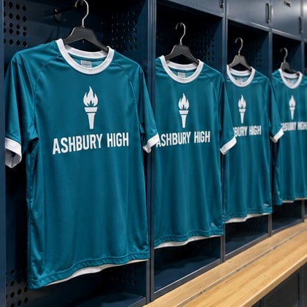 Custom high school soccer jerseys in a locker room