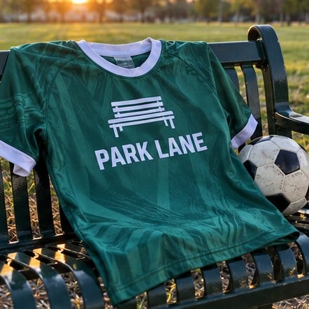 Custom soccer jersey on a park bench